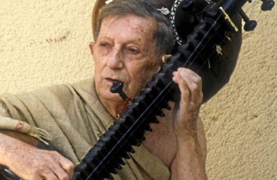 Alain Daniélou playing sitar, 1987