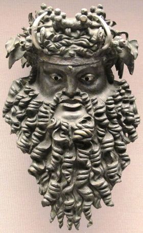 Bronze mask depicting Dionysus bearded and horned, 200 BC – 100 AD